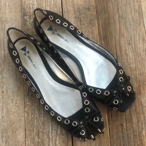 Size 10 black peep, toe flat with silver grommet details and bow